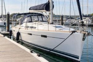 Boat on a marina berth being prepared for sale